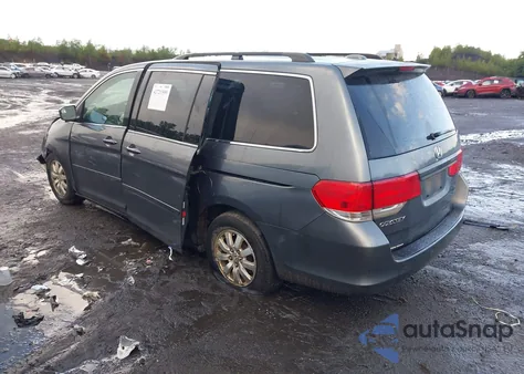 2010 Honda Odyssey Exl z USA, uszkodzony, nr VIN 5FNRL3H78AB015933